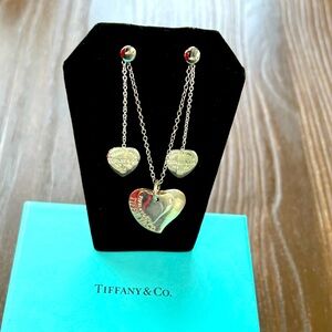 Authentic Tiffany Pendant Only in mint condition,comes in box.